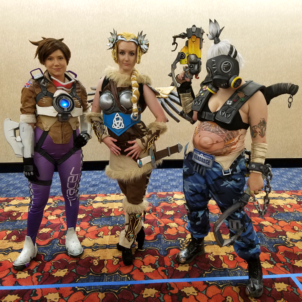 Valkyrie Mercy Cosplay at Gen Con 2016 - with Ginoza Costuming as genderbent Roadhog and AshTheStampede as Tracer