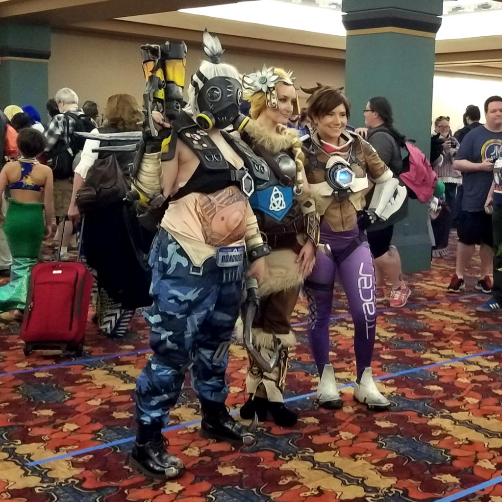 Valkyrie Mercy Cosplay at Gen Con 2016 - with Ginoza Costuming as genderbent Roadhog and AshTheStampede as Tracer