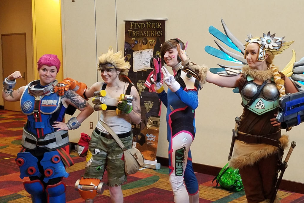 Valkyrie Mercy Cosplay at Gen Con 2017 - with group of Overwatch Cosplayers